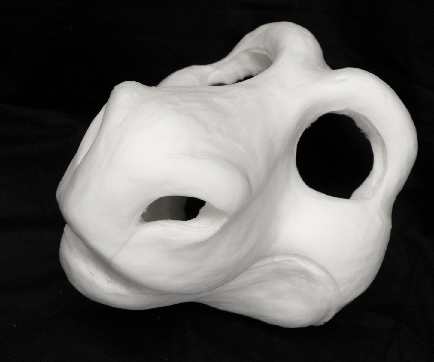 Raptor foam head base for costumes, mascots and fursuits.